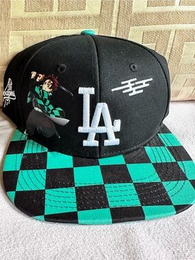 Demon Slayer & Dodgers co-lab  Snapback Hat in Black & Teal 
Collectors Item